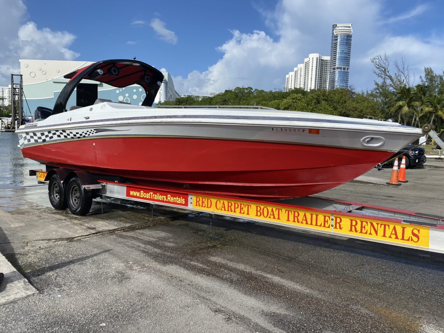 image of a Red Carpet Boat Trailer taking a boat